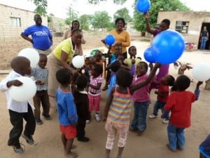 The kids having fun with balloons The kids having fun with balloons